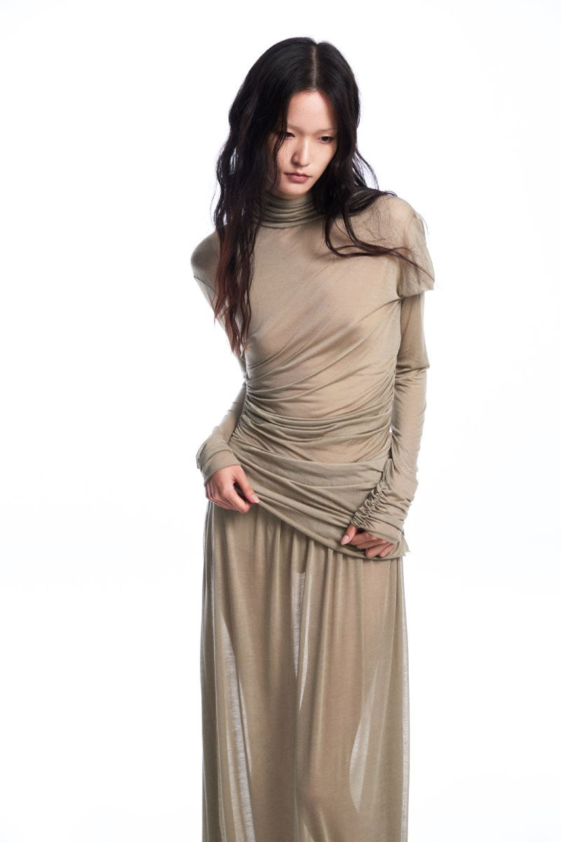 Chictopia draped jersey maxi dress in soft fabric, featuring a flowing silhouette and elegant draping design.