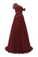 Le Thanh Hoa luminous flame gown featuring flowing fabric and intricate design, perfect for elegant evening occasions.