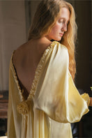 Brown silk custom gown robe by Not Just Pajama, featuring a smooth, luxurious fabric and elegant design, displayed on a hanger.