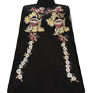 Nadya Shah Gaia Black Wisteria Cape jacket with flowing fabric and intricate Wisteria design, stylish and elegant outerwear.
