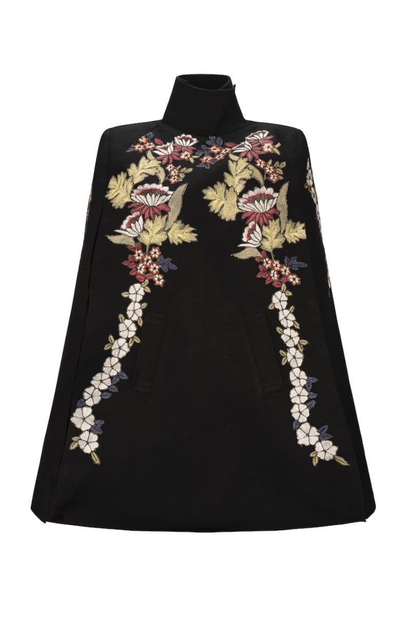 Nadya Shah Gaia Black Wisteria Cape jacket with flowing fabric and intricate Wisteria design, stylish and elegant outerwear.