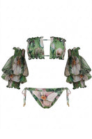 Golden Aura Bikini by Nur Karaata, featuring a shimmering gold bikini top and bottom on a model.