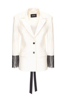 White Vaska blazer with beaded fringe, stylish tailored jacket featuring decorative beaded fringe detail on the sleeves and front.