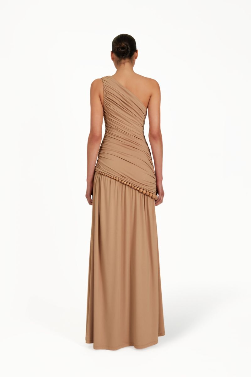 Khanum's tan KASBA maxi dress with flowing fabric and elegant design, perfect for casual and semi-formal occasions.