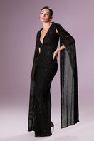 Nur Karaata Giovan Gown in elegant fabric, featuring intricate embroidery and a flowing silhouette for sophisticated style.