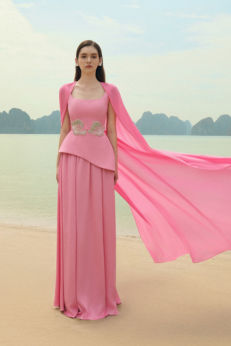 Lune De Soie ruched silk gown in elegant design, showcasing a flowing, luxurious silk fabric with detailed ruching.
