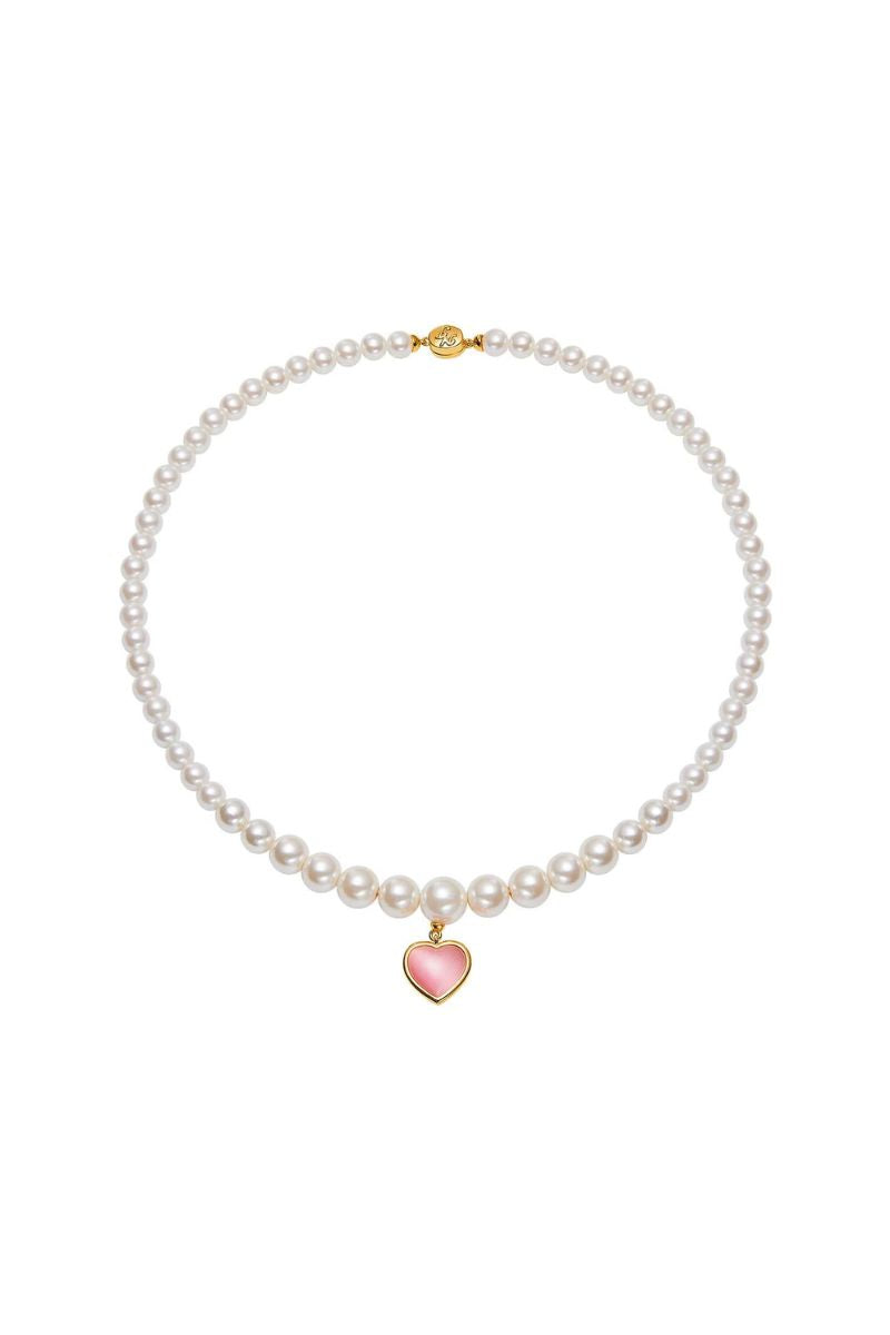 Pink and pearl heart necklace by Nana Jacqueline featuring a delicate chain and elegant heart pendant.