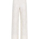 Cream Jora fringe trousers by Sélone, stylish pants with fringe detailing, showcased on a model against a neutral background.