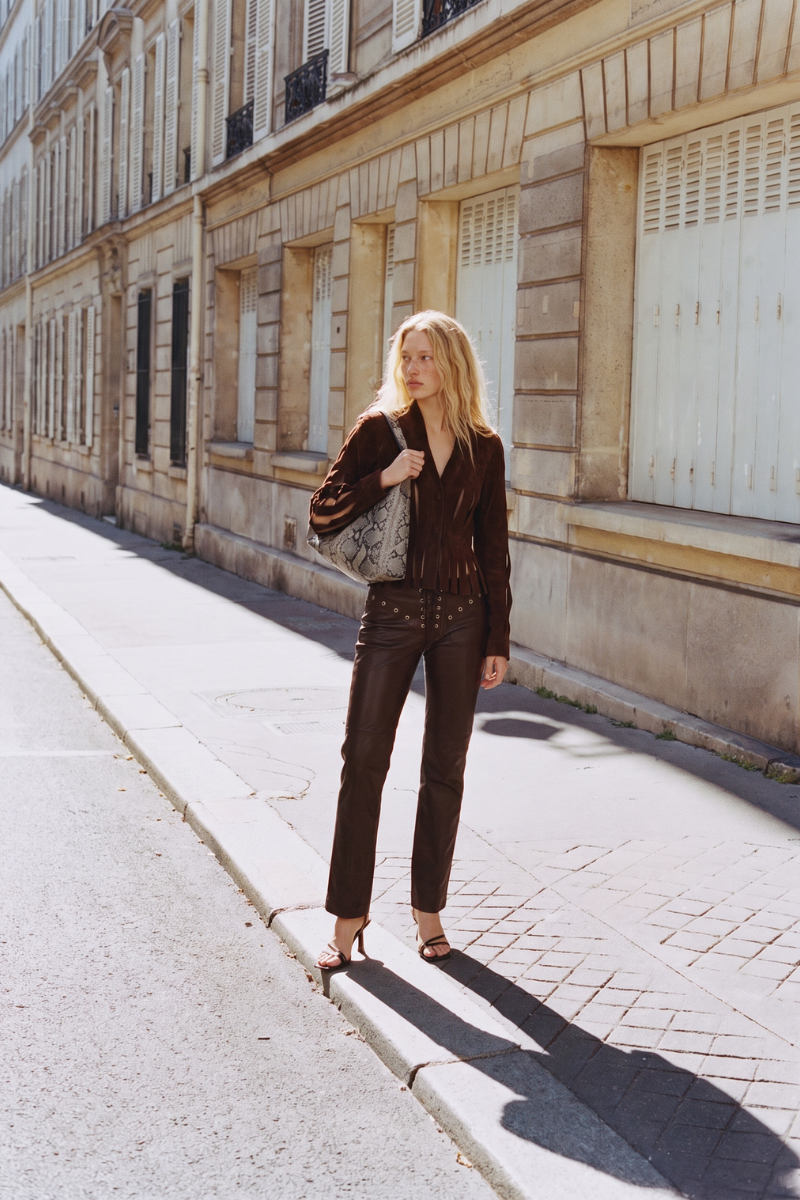 Double A CULT MIA X Brianna suede brown jacket with a tailored fit and classic design, shown on a hanger.