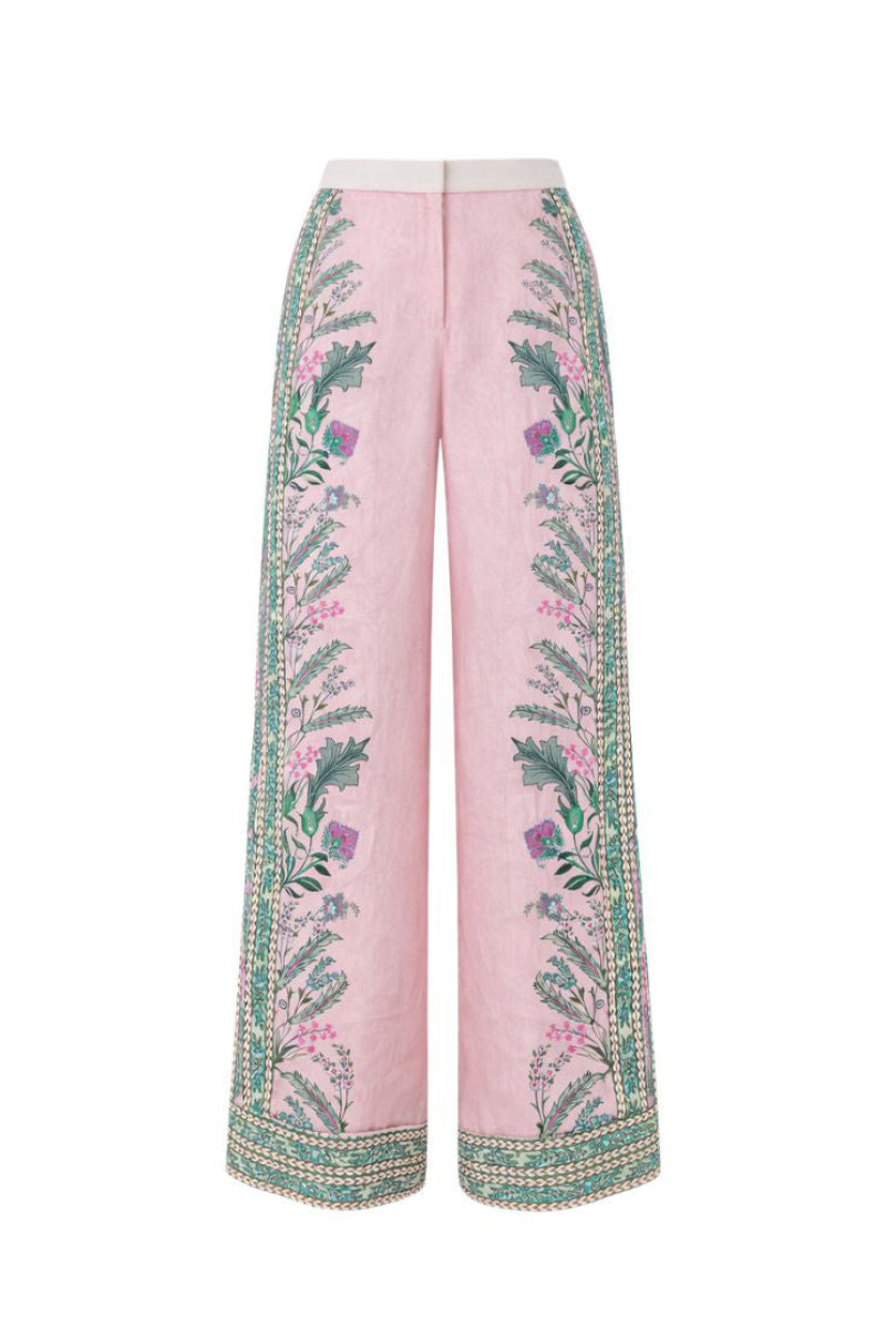 Raishma ARIYAH trousers featuring a stylish, tailored pant design with a high waist and sleek fit, shown in a neutral color.