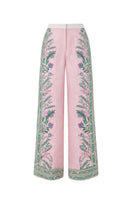 Raishma Ariyah trousers, stylish pants with a tailored fit and modern design, shown in a neutral fabric and relaxed silhouette.