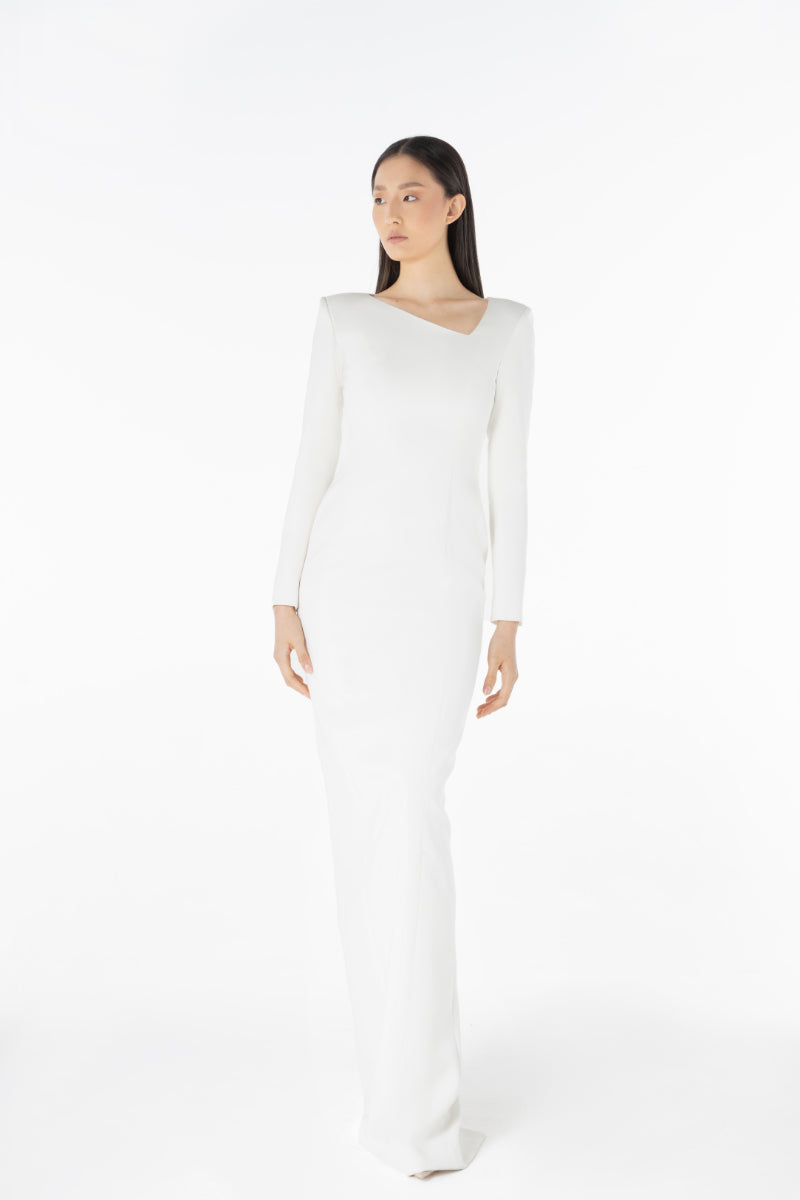 Lili Blanc asymmetric maxi dress in flowing fabric with a stylish slit and elegant design, perfect for formal or summer occasions.