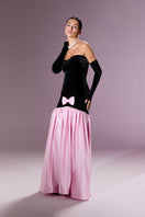 Nur Karaata Marcelline gown showcasing elegant design with flowing fabric and intricate details.