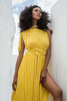Kasia Kulenty Luna gown in Sol, a flowy maxi dress with soft fabric and elegant design, shown in a vibrant sunlight-inspired color