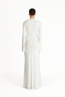 Khanum's white Keli maxi dress featuring a flowing fabric and elegant design for stylish summer wear.