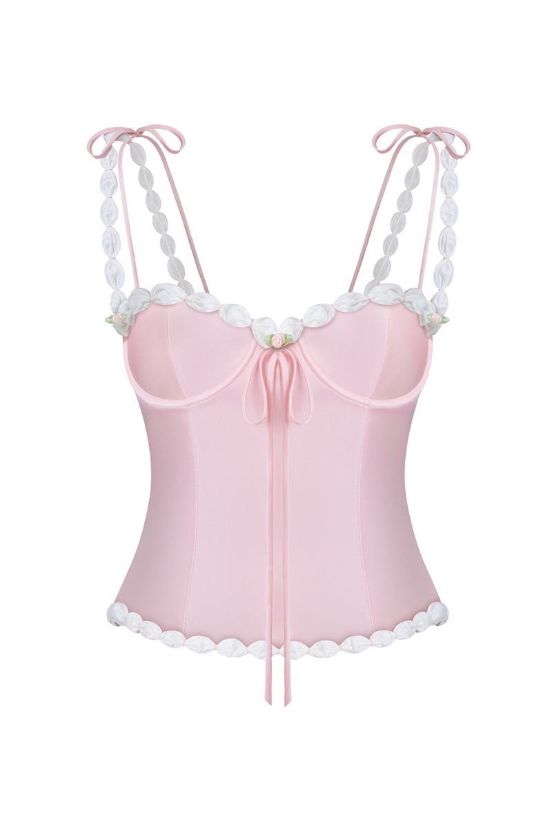 Light pink cake bustier top by Stolen Stores, featuring a fitted design and stylish details, perfect for trendy fashion looks.