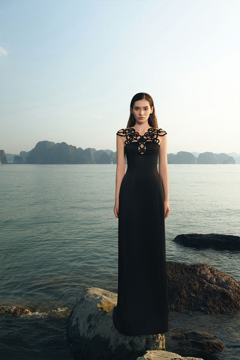 Lune De Soie black Lycra taffeta gown showing elegant fitted silhouette and flowing fabric for formal occasions.