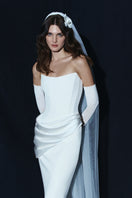 Elegant BALYKINA HOPE GOWN with intricate lace details and flowing fabric, perfect for special occasions.