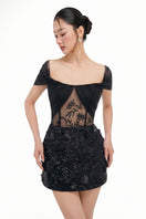 Black Mirabelle tulle dress by 21Six, a stylish mini dress with delicate tulle fabric and elegant design.