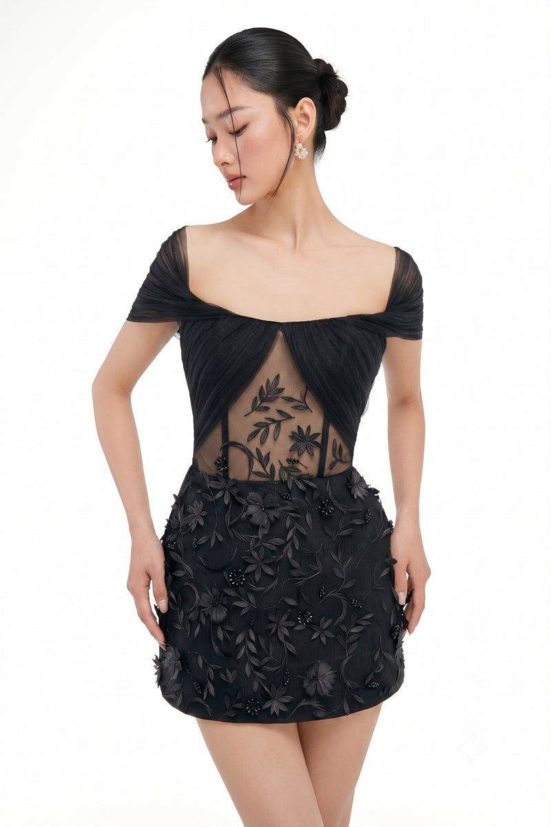 Black Mirabelle tulle dress by 21Six, a stylish mini dress with delicate tulle fabric and elegant design.