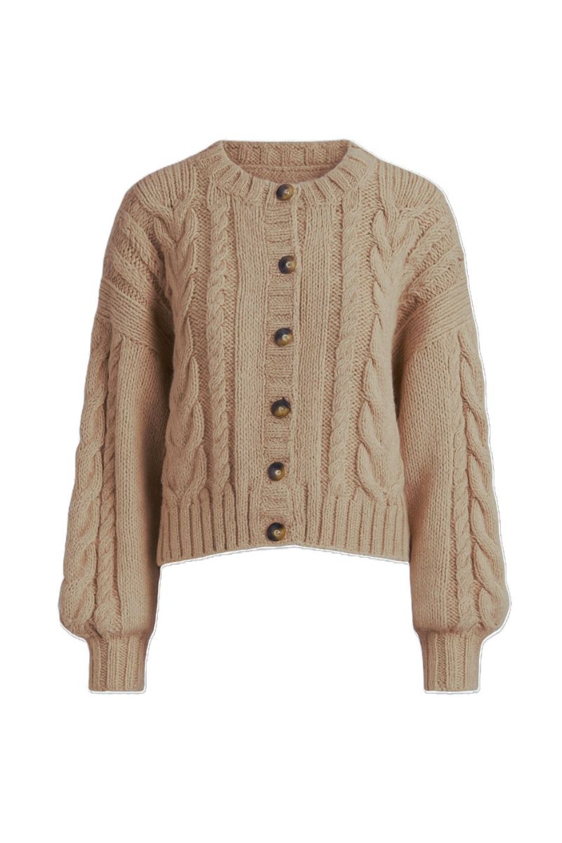 First Born Knits Lulu cardigan, soft knit, long-sleeve design with button closure, in a cozy, neutral color.