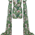 Nur Karaata Poppy Reverie mini dress featuring a floral pattern, sleeveless design, and flowing fabric.