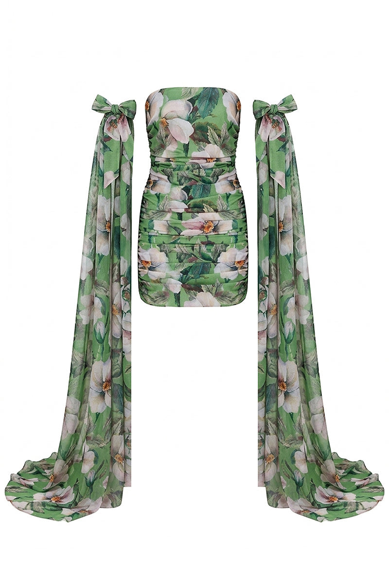 Nur Karaata Poppy Reverie mini dress featuring a floral pattern, sleeveless design, and flowing fabric.