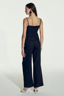 Nazlı Ceren Marona linen top in dark navy, lightweight and stylish with a relaxed fit, displayed on a hanger.