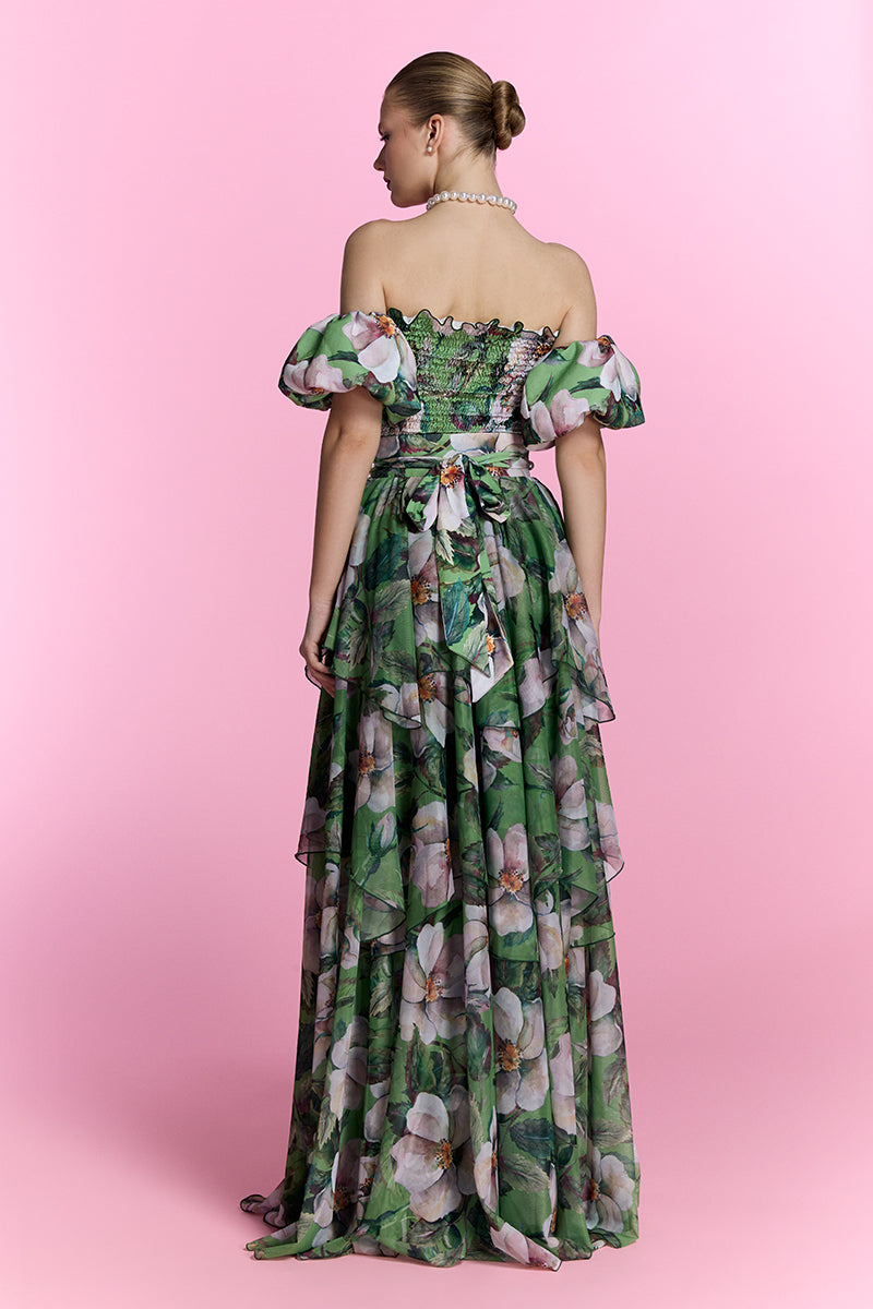 Nur Karaata Provence Poème gown displayed on a hanger, featuring elegant fabric and intricate details perfect for formal occasions.