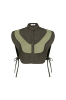 Ana + Maria Vivra bib top in lichen green and sage green, showing a stylish sleeveless blouse with a relaxed fit.