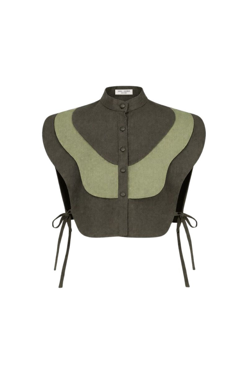 Ana + Maria Vivra bib top in lichen green and sage green, showing a stylish sleeveless blouse with a relaxed fit.
