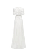 Tracy Studio grain weave gown featuring a flowing, textured fabric with a relaxed fit and elegant design.