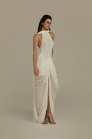 White POEM Elara maxi dress with flowing fabric and elegant design, perfect for summer or formal occasions.