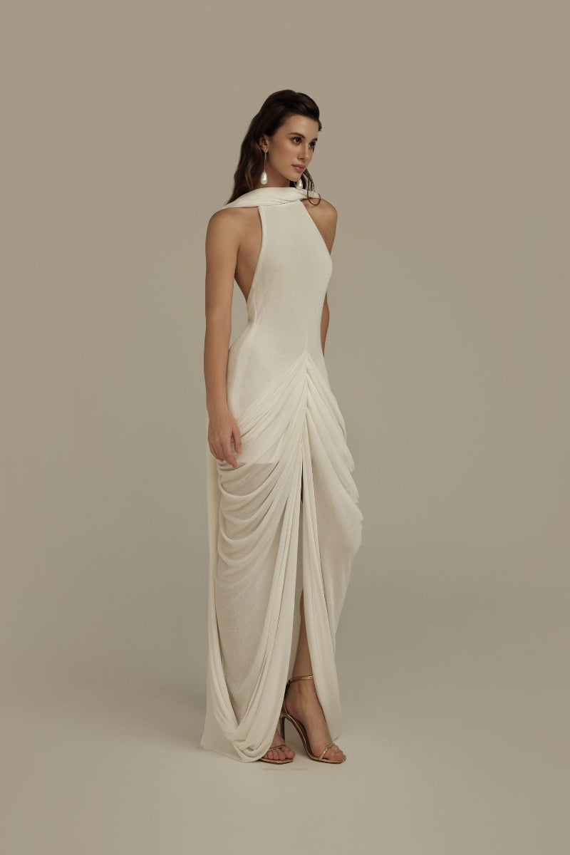 White POEM Elara maxi dress with flowing fabric and elegant design, perfect for summer or formal occasions.