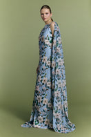 Nur Karaata Whisper Wind gown featuring flowing fabric and elegant design, displayed on a mannequin.