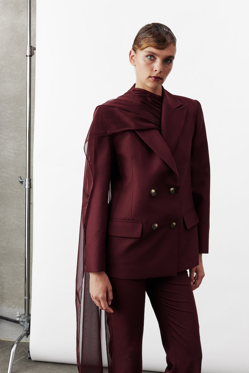 Nazlı Ceren Elodie Bordeaux jacket featuring a tailored fit and stylish design, displayed on a hanger.