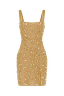 Kerri mini dress in gold by Khanum's, featuring a fitted silhouette and stylish design, shown on a model.