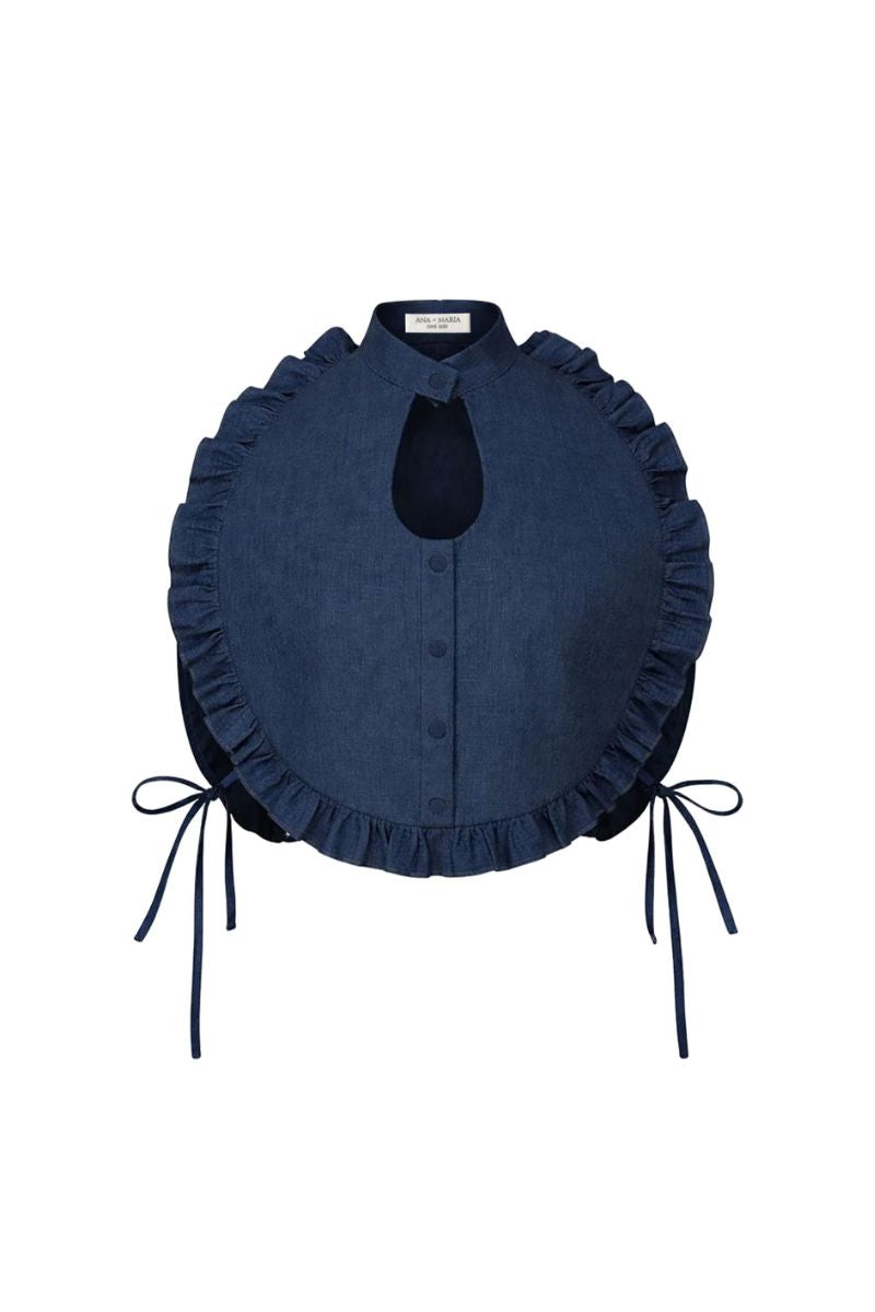 Dark blue Ellen Bib top by ANA + MARIA, shown with its stylish design and fabric details.