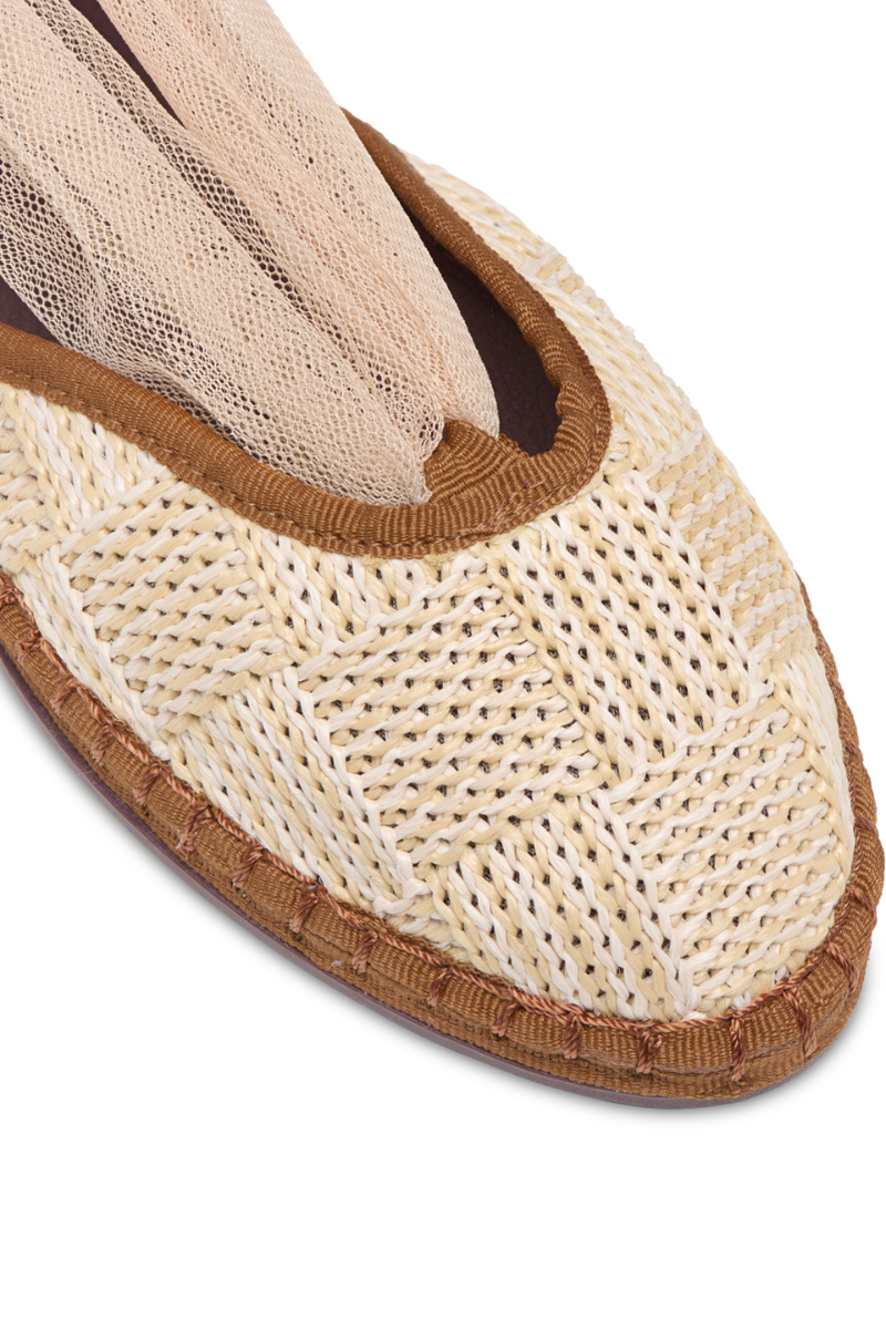 Flabelus Isabella craft brown flats with light brown piping, featuring a sleek design and comfortable slip-on style.