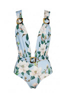 Nur Karaata AQUA ALLURE one-piece swimsuit featuring a sleek, fitted design with vibrant blue and aqua tones.