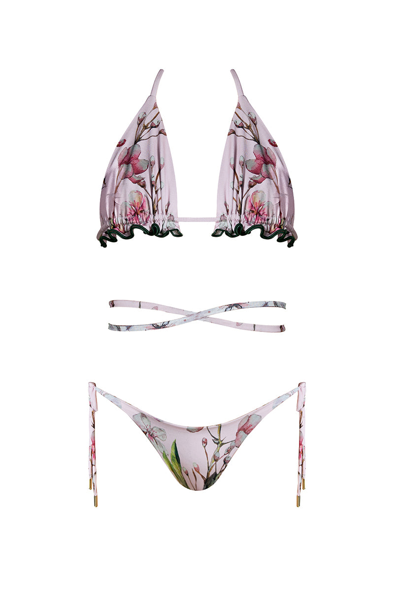 Nur Karaata Sunset Palms Bikini featuring a colorful tropical print and stylish bikini top and bottom ensemble.