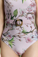 Nur Karaata Marbella Muse one-piece swimsuit featuring a stylish cut and vibrant pattern, perfect for beach or poolside wear.