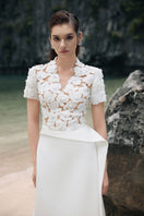 Elegant white satin taffeta gown by Lune De Soie, featuring a flowing design and intricate details suitable for formal occasions.
