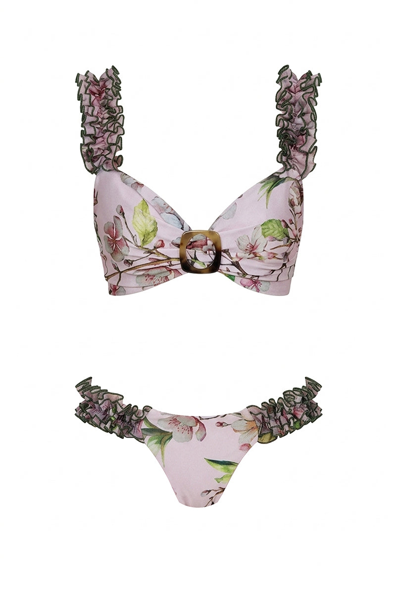 Nur Karaata St. Tropez Sway Bikini set with vibrant patterned fabric and adjustable straps, perfect for beachwear and sunbathing.
