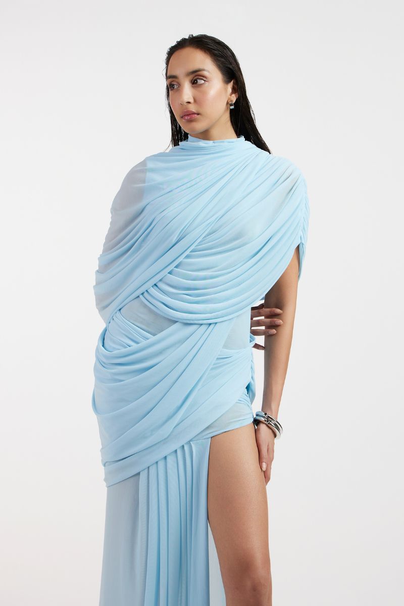 Deme By Gabriella Jovana draped blue maxi dress with flowing fabric and elegant design, perfect for formal or summer occasions.