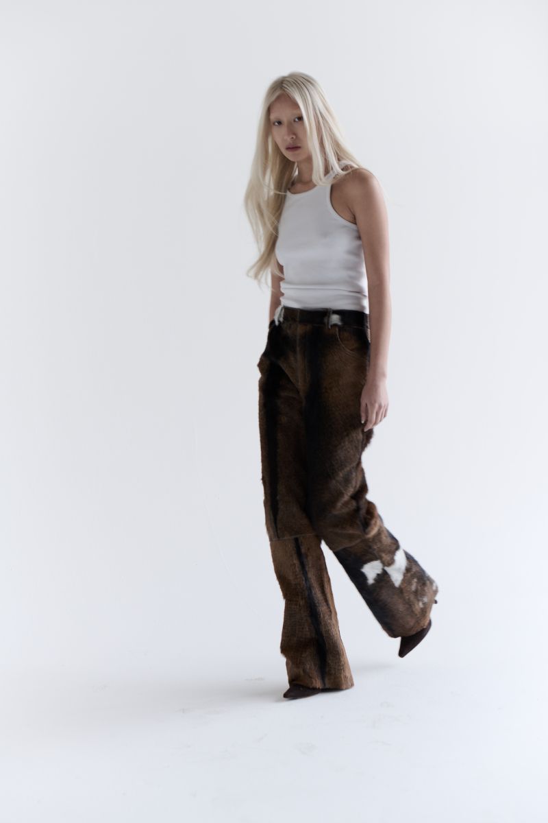 ZUT Ascot leather pants featuring sleek black leather material and tailored fit, displayed on a neutral background.