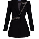 Black tailored blazer vest with an asymmetrical side-tie belt, stylish GVLUX vest for a modern, sophisticated look.