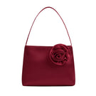 Red Tuscan Rose silk shoulder handbag by Not Just Pajama with a sleek, elegant design and smooth silk fabric.
