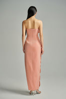 Pink velvet strapless V-neck gown by HAPPY CLOTHING with petal straps from the CULT MIA X HAPPY CLOTHING collection.