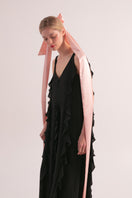 Overthesea black Waves maxi dress featuring flowing fabric and a stylish design, perfect for elegant summer occasions.
